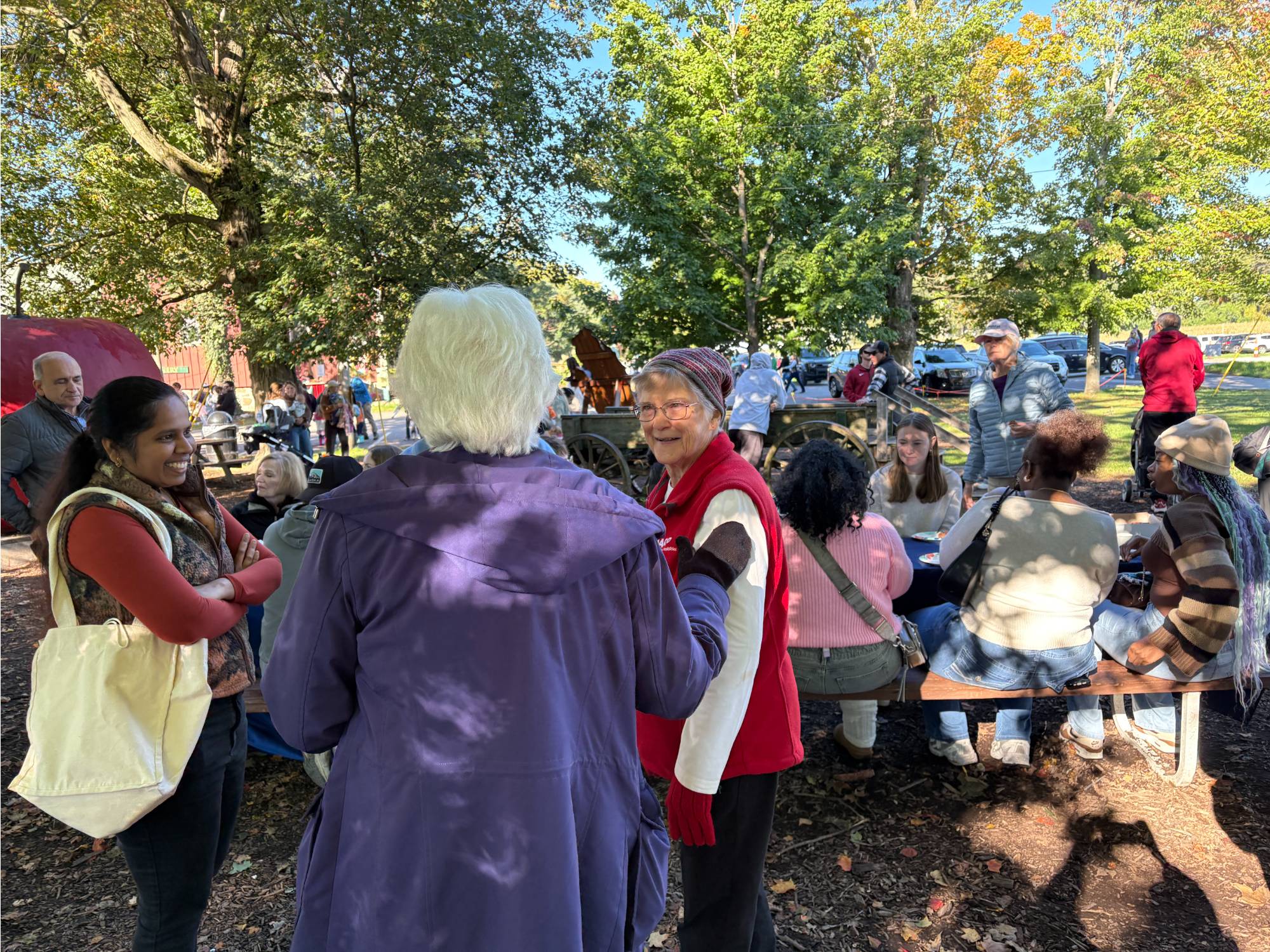 3 people talking to each other in a circle